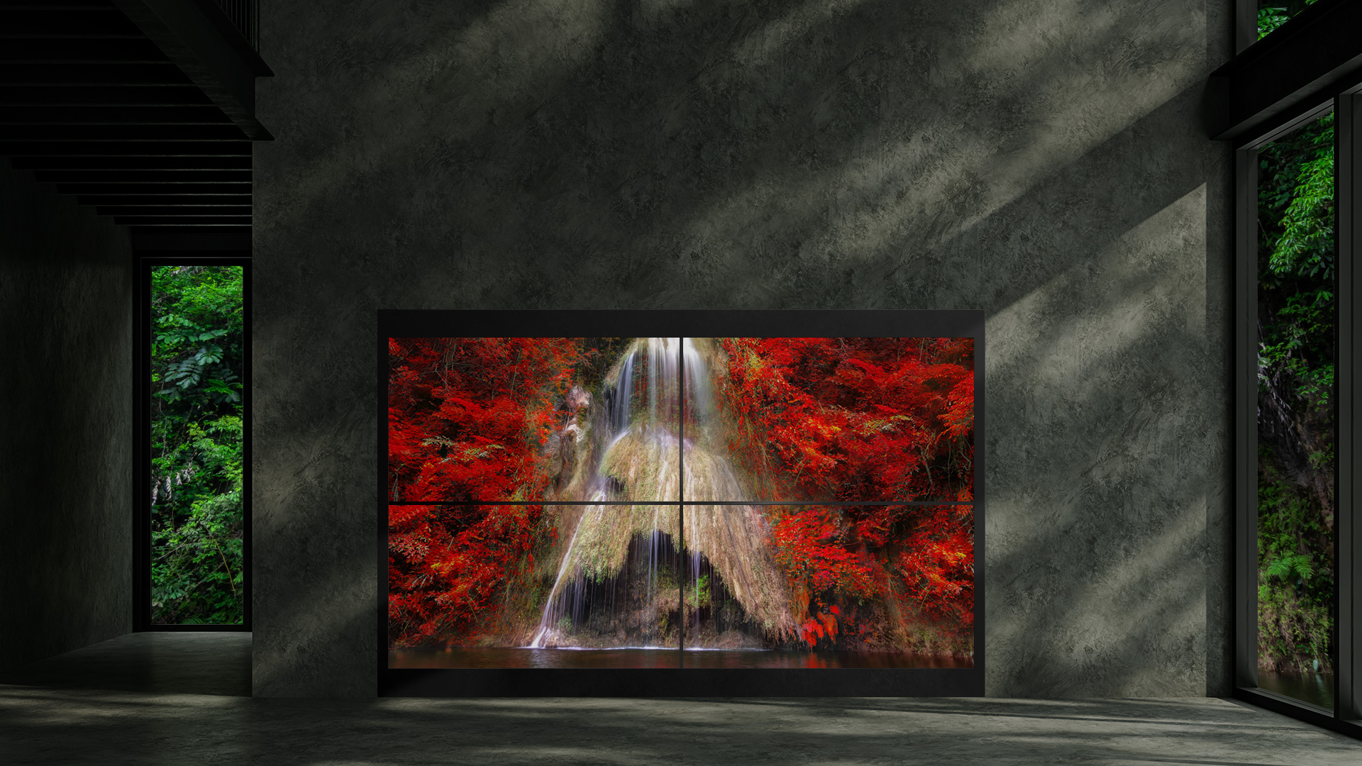 Single Transparent OLED signage displaying an imagery of mountain tree leaves turning into red with the view of the waterfall in the middle.